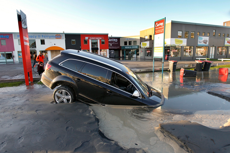 Illustration for article titled New Christchurch earthquake swallows SUV